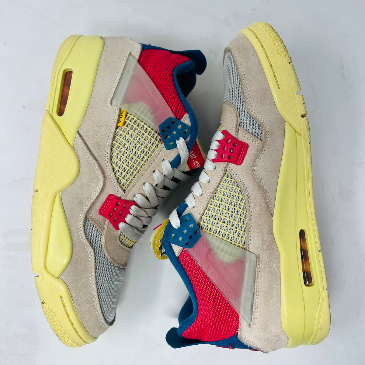 Jordan 4 Retro Union Guava Ice