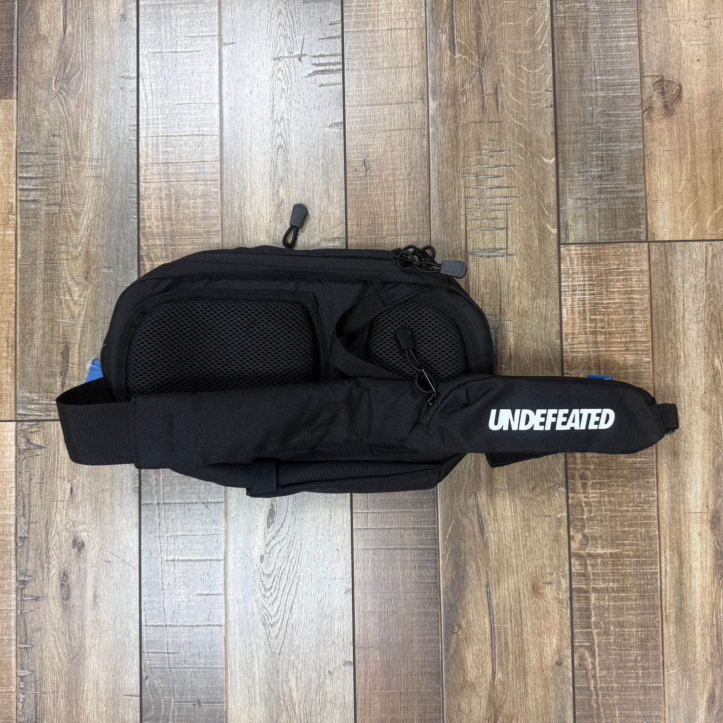 UNDEFEATED MINI CROSSBODY BAG