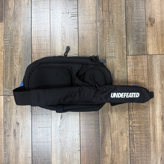 UNDEFEATED MINI CROSSBODY BAG