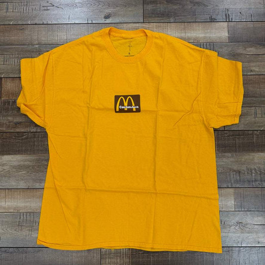 Travis Scott x McDonald's Sesame Inv II T-shirt in yellow, brand new condition.