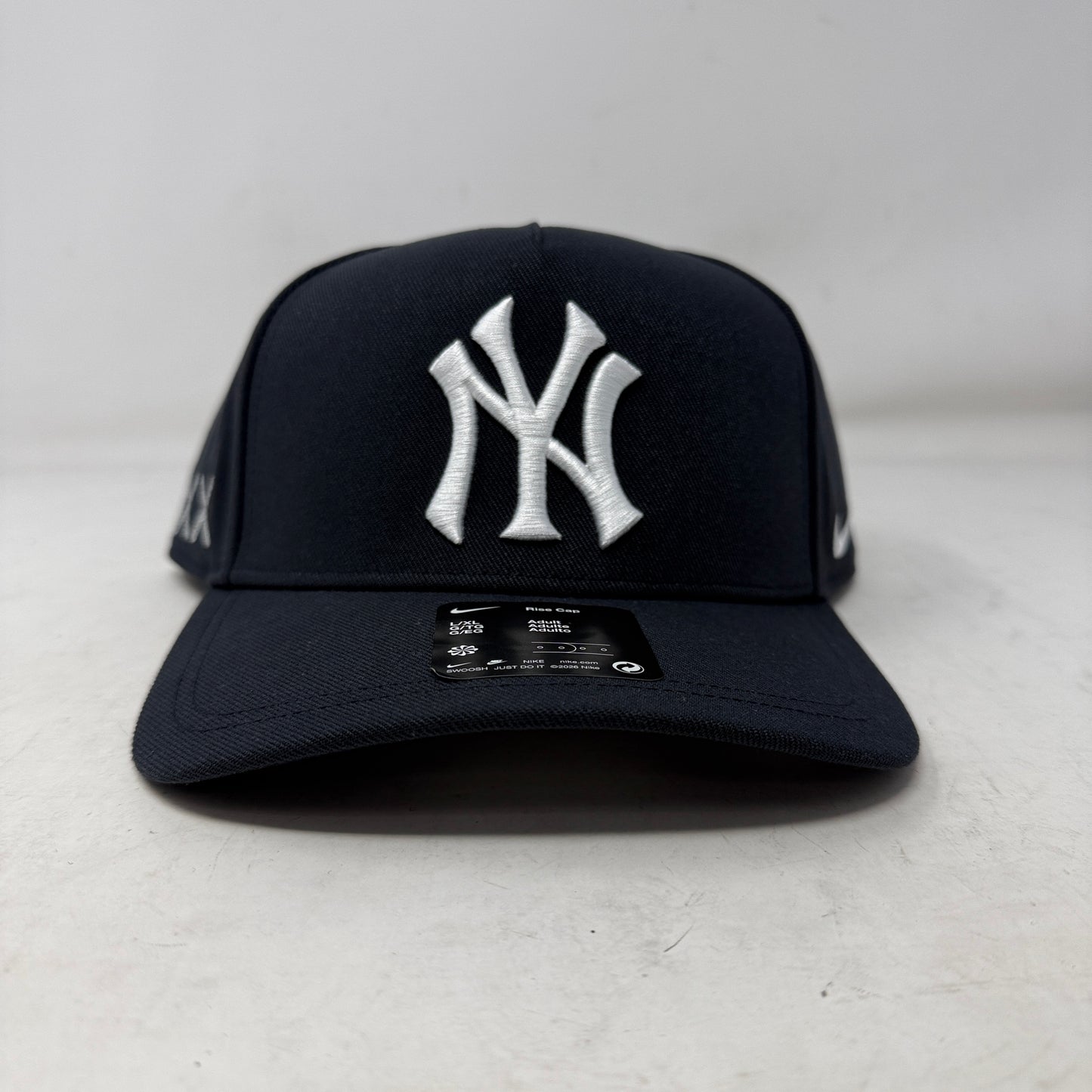 Yankees Nike x KAWS Navy Dri-FIT Structured A-Frame Adjustable Hat