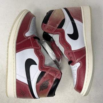 Brand new Jordan 1 Retro High Trophy Room Chicago sneakers in red, white, and black on a blue Nike box. An invitation card from 2021 and a basketball-themed certificate in front highlight the authenticity of these iconic Jordan shoes.