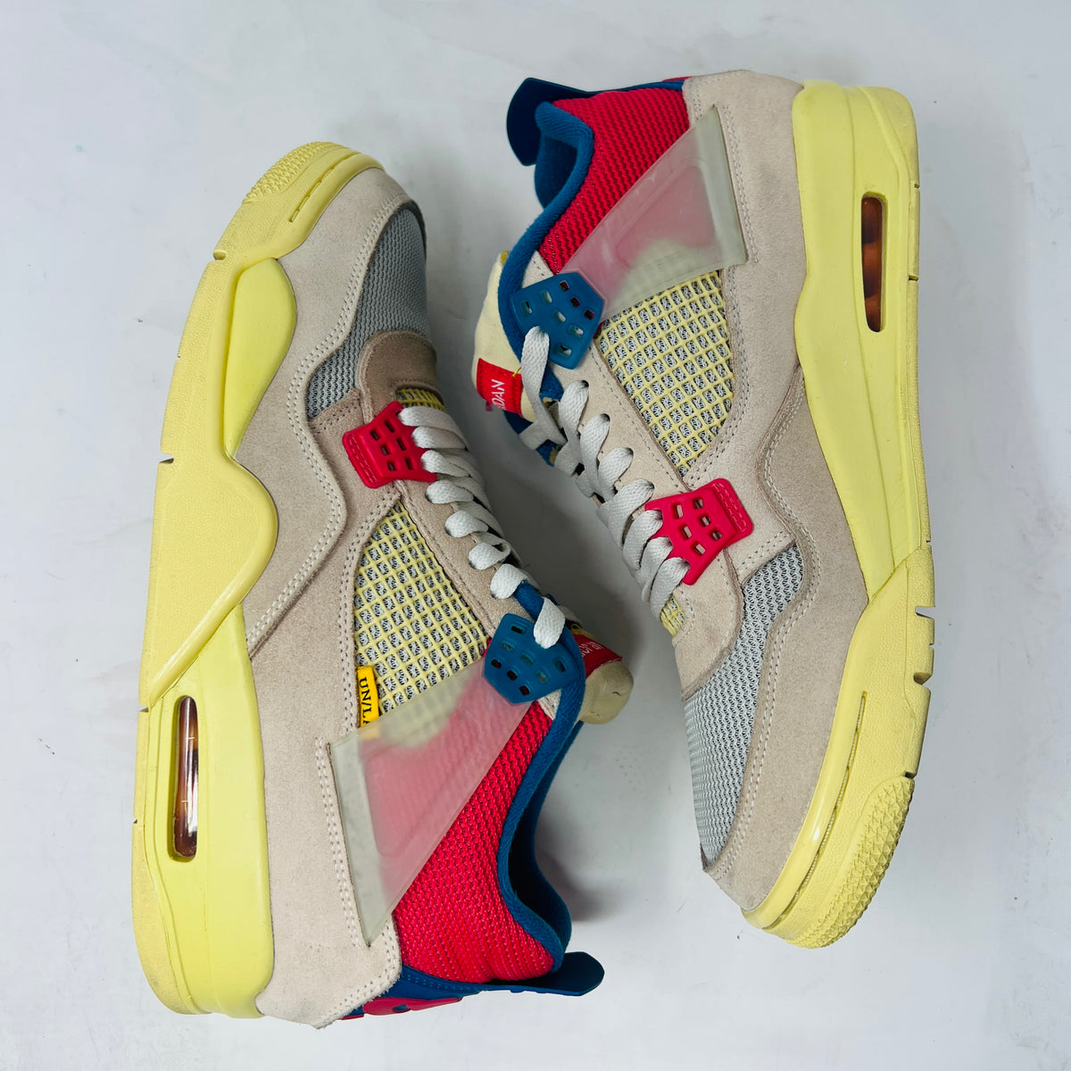 Jordan 4 Retro Union Guava Ice