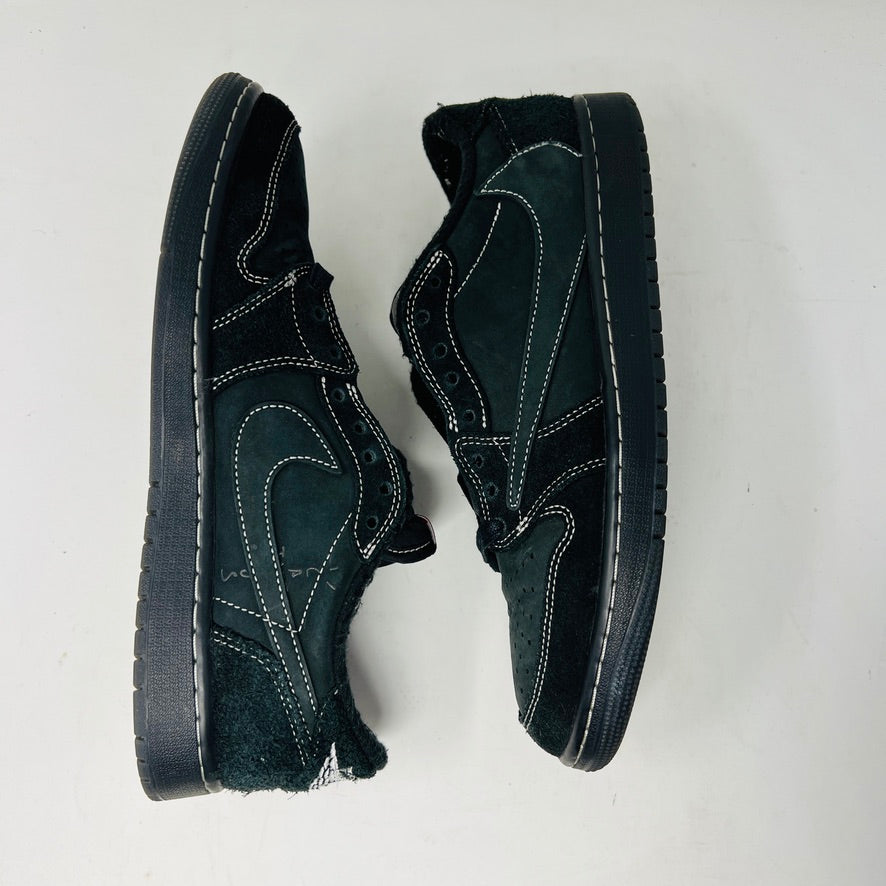The Jordan 1 Retro Low OG SP Travis Scott Black Phantom sneaker, featured on a Nike box, flaunts black suede with a clean upper and white swoosh. Size info: US 9.5, Euro 43, UK 8.5, CM 27.5—ideal for general wear due to its visible stitching design.