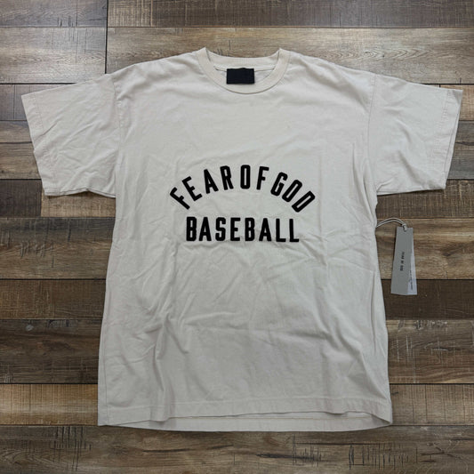 Fear of God Baseball T-shirt in beige with bold lettering on front, brand new condition.