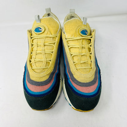 The Nike Air Max 1/97 Sean Wotherspoon sneakers showcase a colorful upper with hues of yellow, blue, and pink. They include extra blue and white laces and come in a red box labeled with size 9.5.