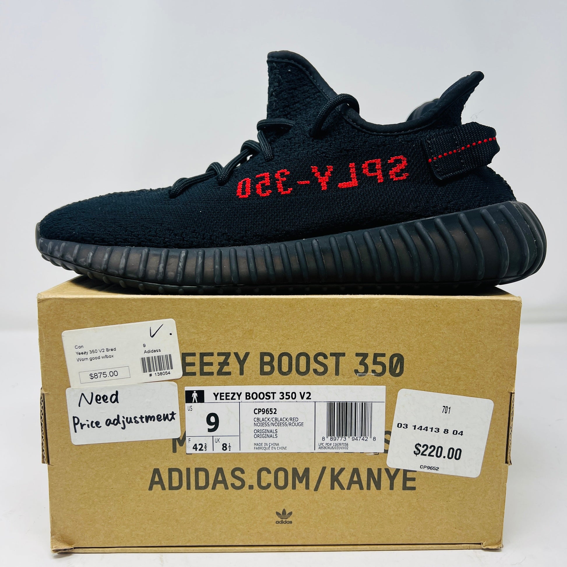 adidas Yeezy Boost 350 V2 Black Red sneakers in good condition with original box, 2017/2020 model.