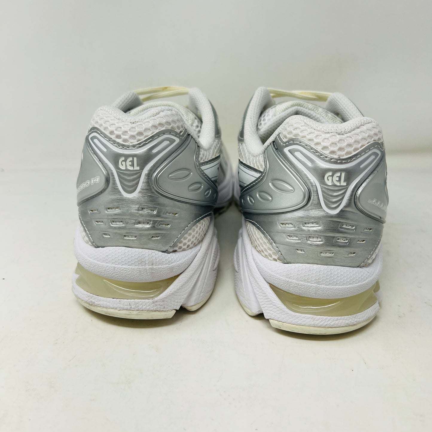 ASICS Gel-Kayano 14 JJJJound Silver White sneaker with clean upper, light wear, in 2021 edition; includes extra laces, on box.