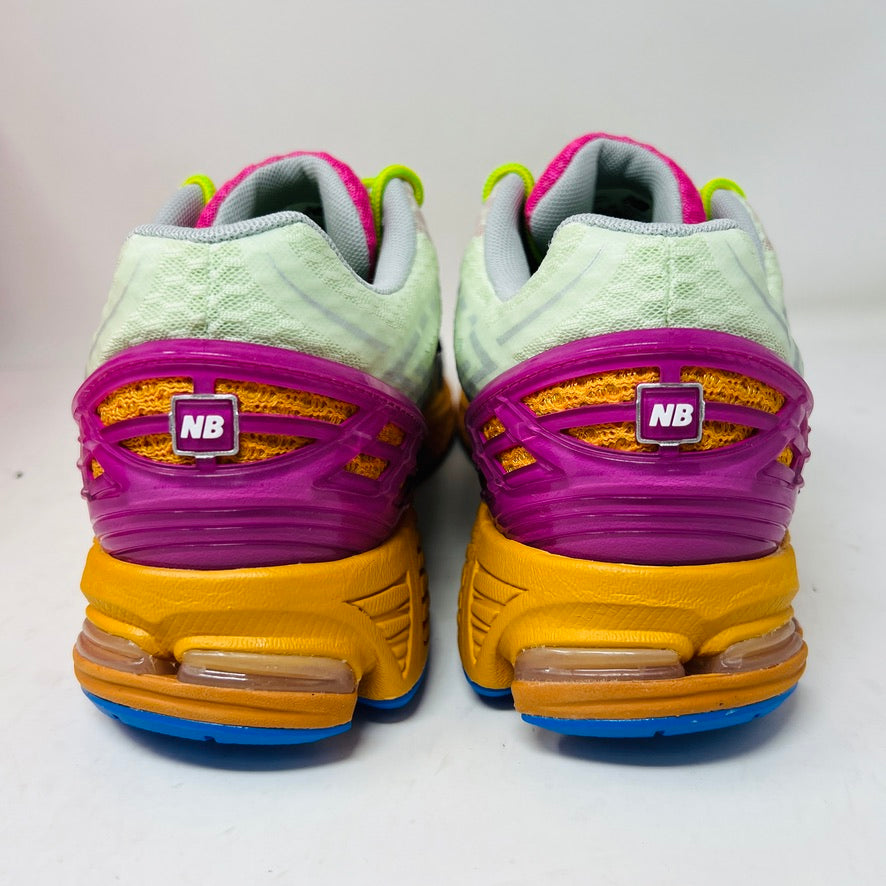 The New Balance 1906R Action Bronson Rosewater sneakers feature white mesh uppers, pink tongues with Baklava, neon green laces, blue accents, and orange midsoles. In BRAND NEW condition, theyre straight from the box.