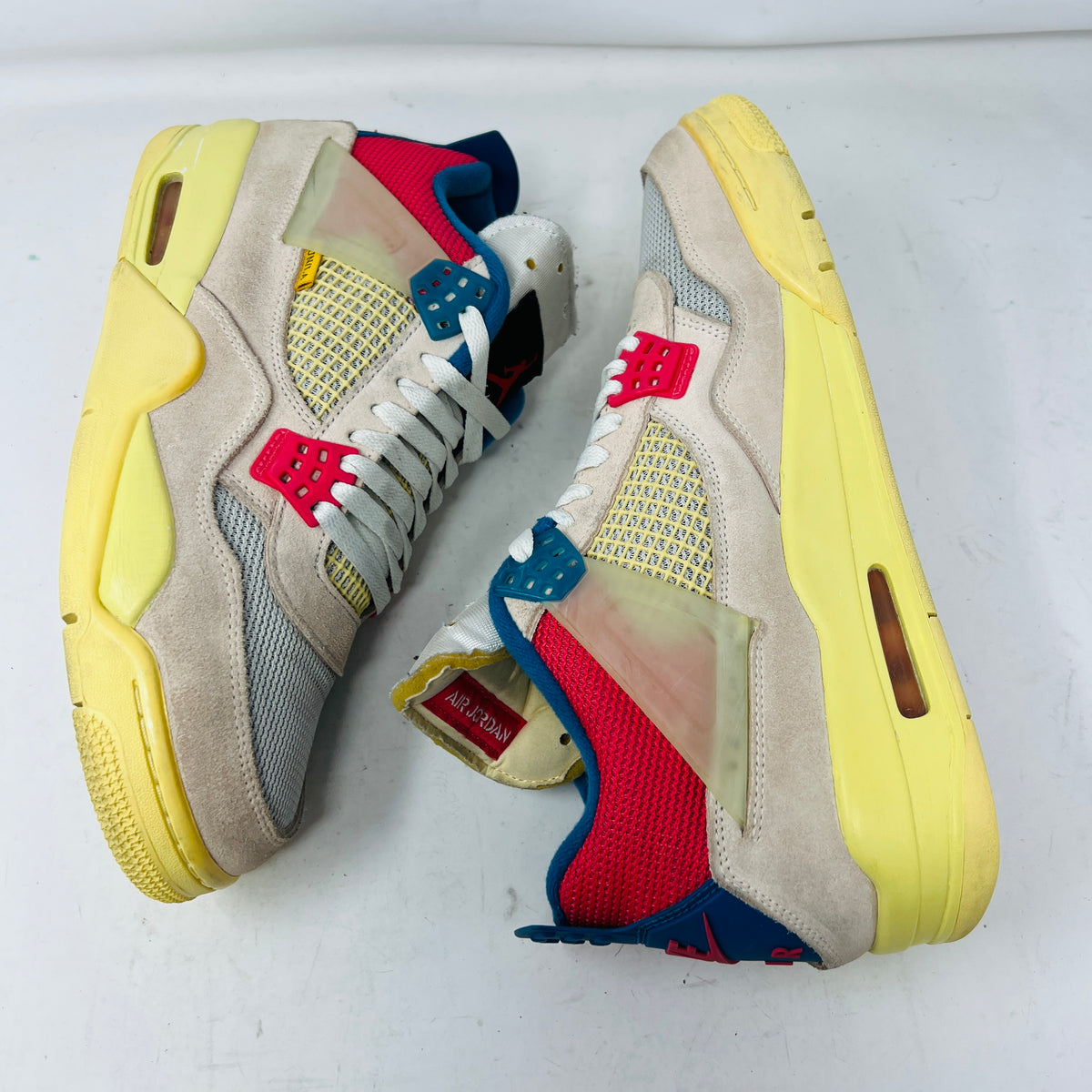 Jordan 4 Retro Union Guava Ice