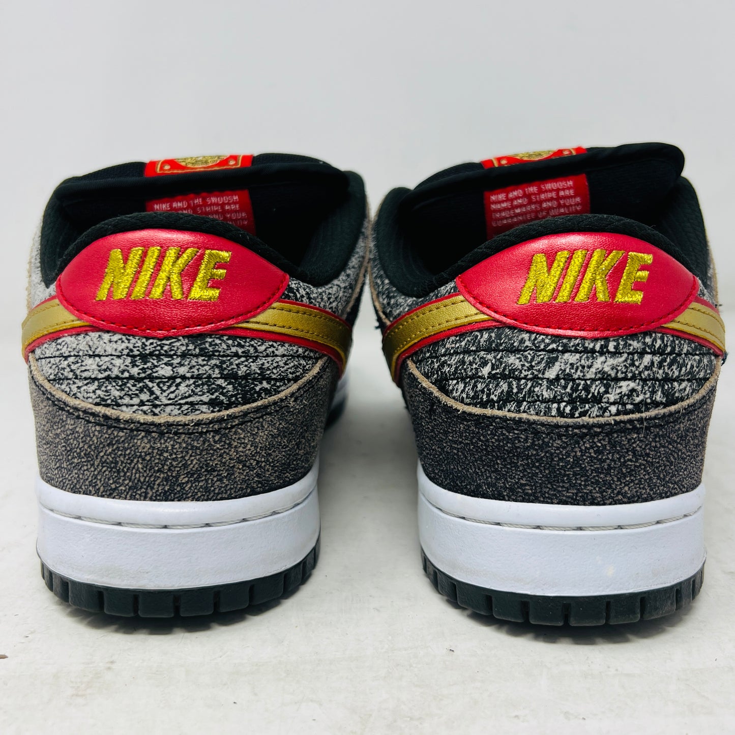 Nike SB Dunk Low Beijing Metallic Gold