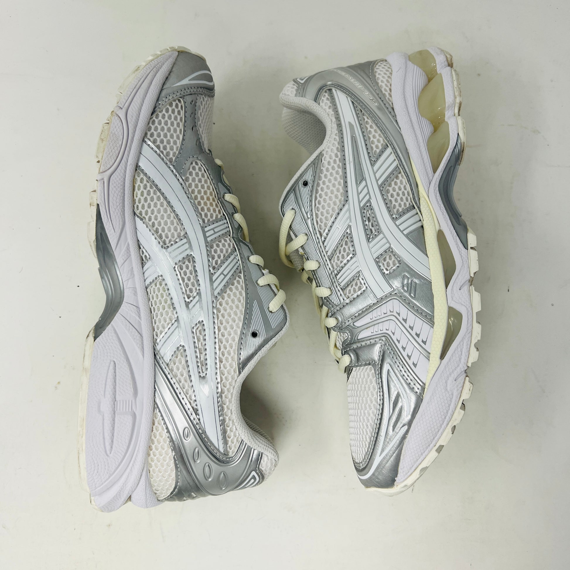 ASICS Gel-Kayano 14 JJJJound Silver White sneaker with clean upper, light wear, in 2021 edition; includes extra laces, on box.