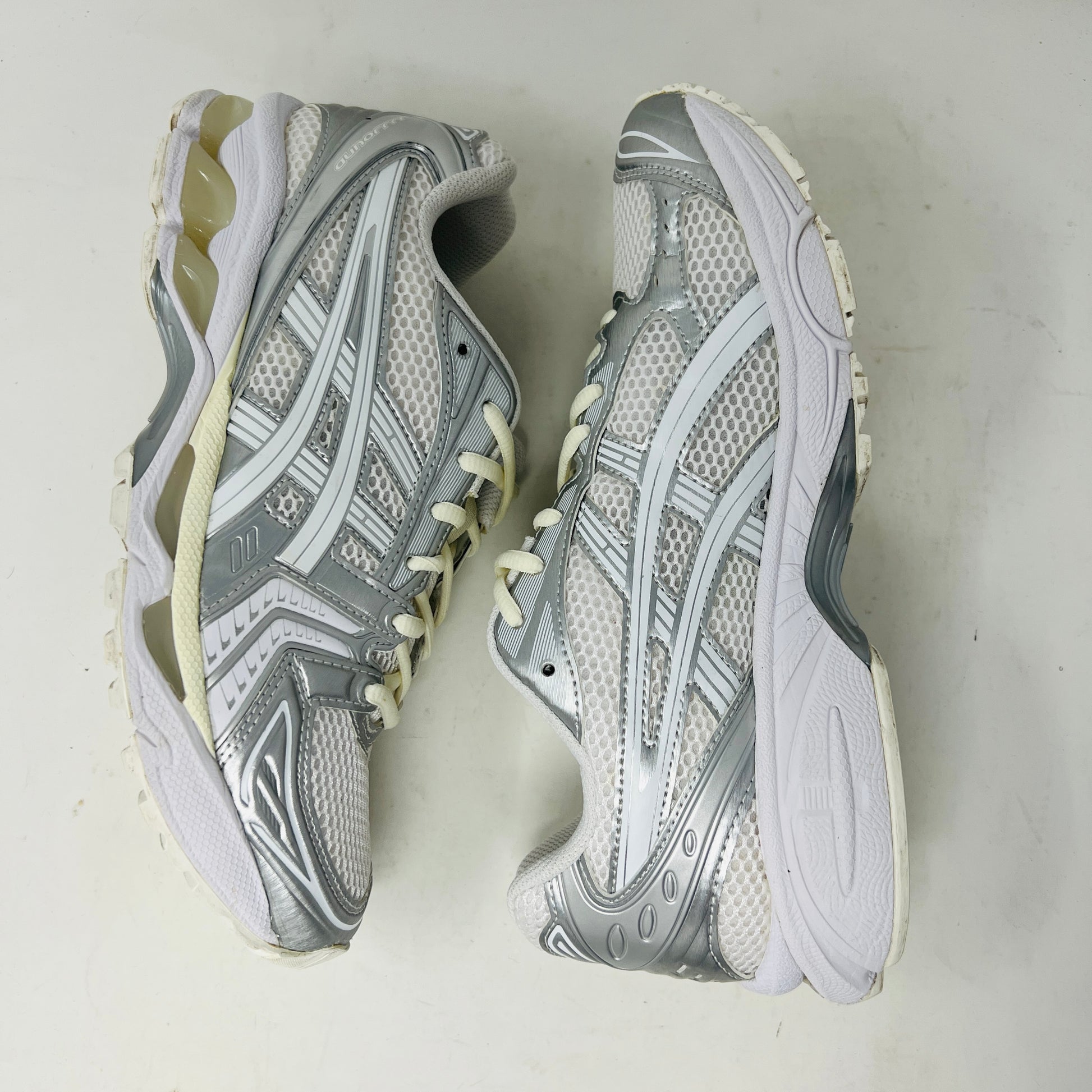 ASICS Gel-Kayano 14 JJJJound Silver White sneaker with clean upper, light wear, in 2021 edition; includes extra laces, on box.