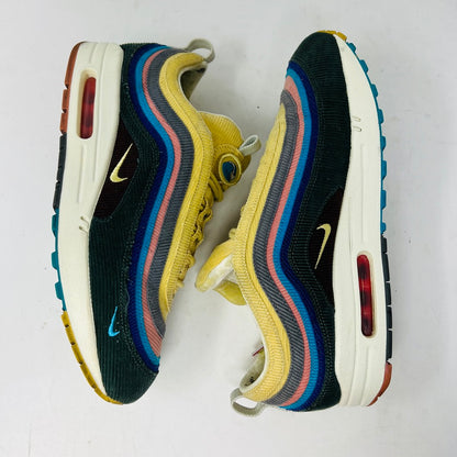 The Nike Air Max 1/97 Sean Wotherspoon sneakers showcase a colorful upper with hues of yellow, blue, and pink. They include extra blue and white laces and come in a red box labeled with size 9.5.