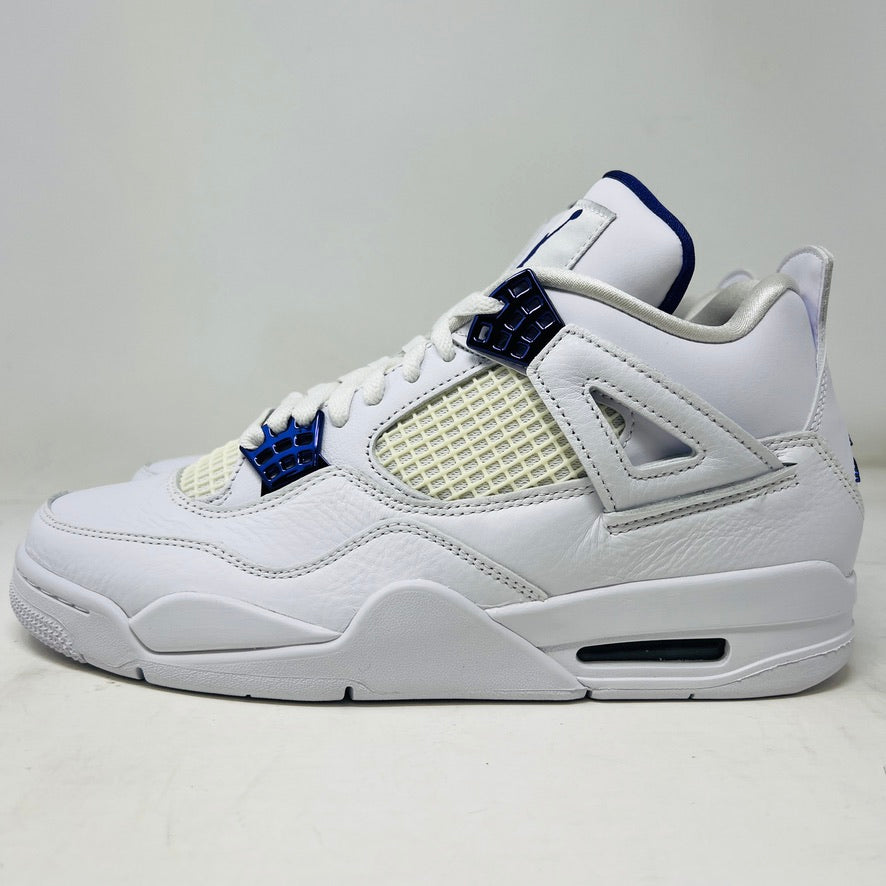 The Jordan 4 Retro Metallic Purple sneaker features white material with blue mesh accents, a visible air cushion in the heel, textured sole, angular overlays, and a padded collar. Note: no box included.
