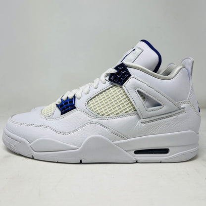 The Jordan 4 Retro Metallic Purple sneaker features white material with blue mesh accents, a visible air cushion in the heel, textured sole, angular overlays, and a padded collar. Note: no box included.