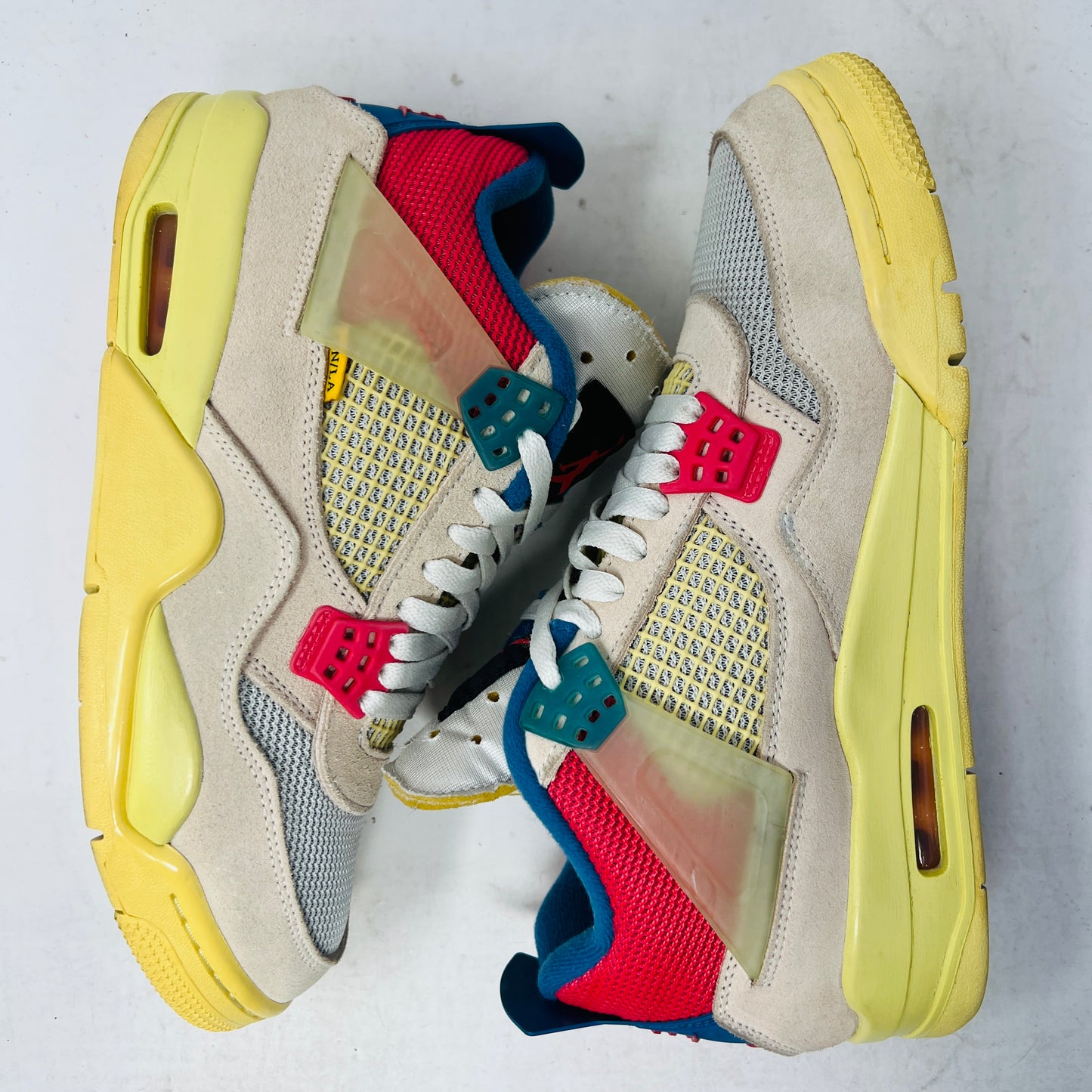 Jordan 4 Retro Union Guava Ice