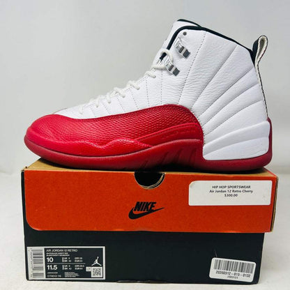 Jordan 12 Retro Cherry 2023 sneakers with clean uppers and general wear, good box condition