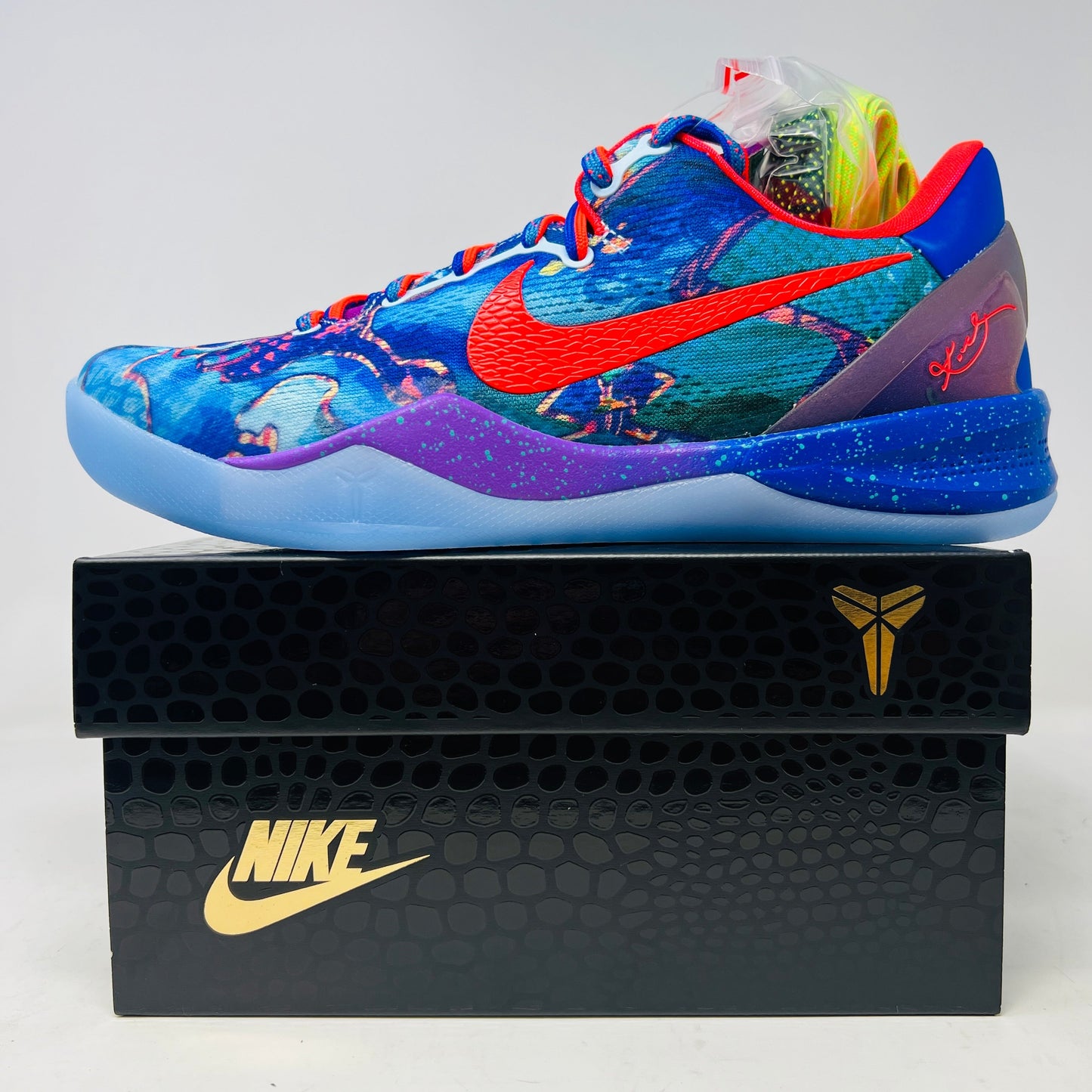 Nike Kobe 8 Protro What The 2025 sneakers in vibrant colors, brand new with extra laces, displayed on original box.