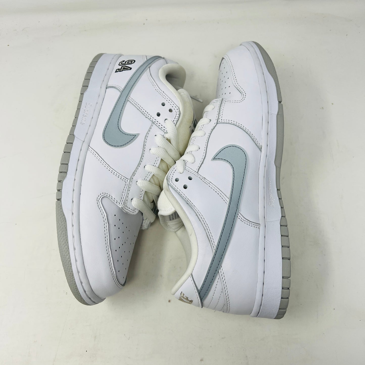 Nike SB Dunk Low Supreme 94 White Metallic Silver