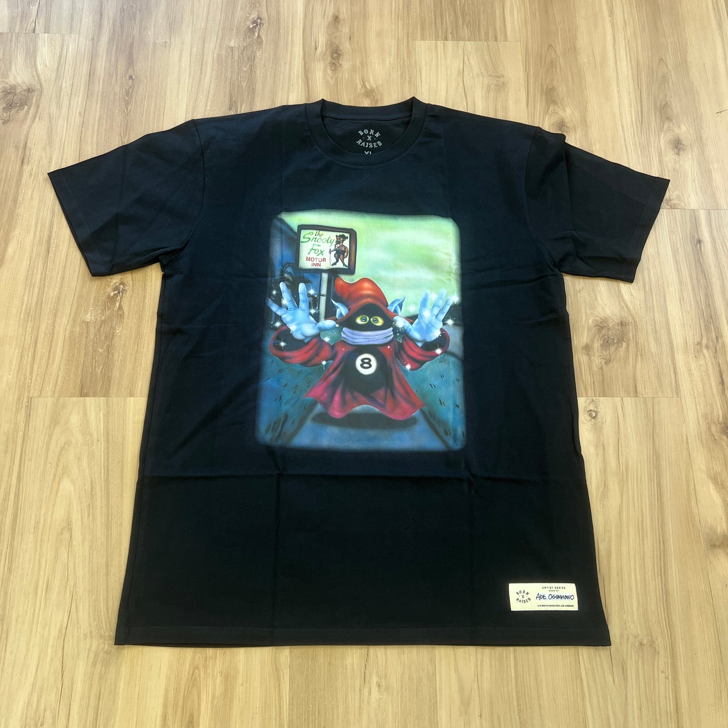 Born X Raised Artist Series "Wild on Western" black t-shirt by Ade Ogunmowo