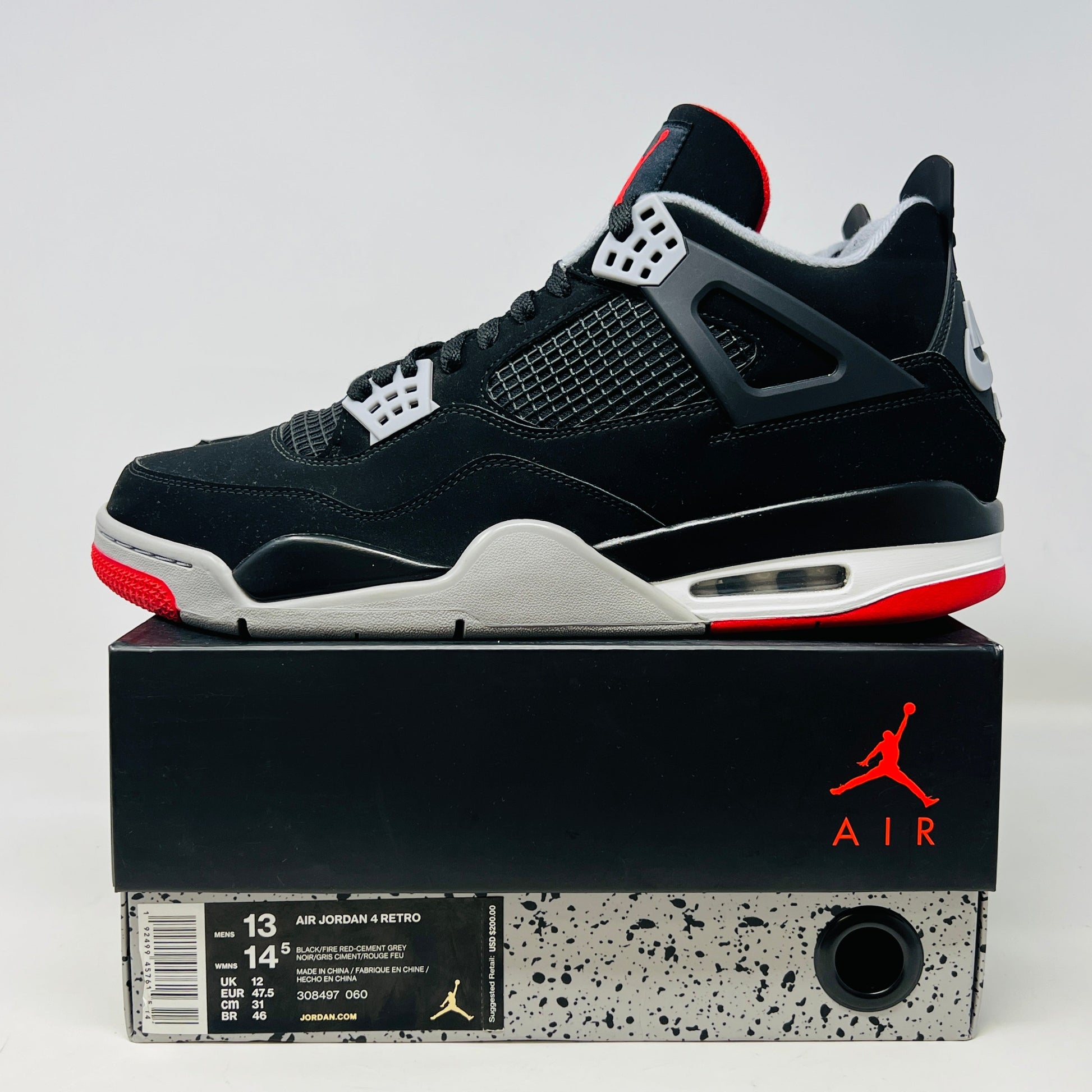 Jordan 4 Retro Bred (2019) sneakers on original box, condition 9/10.