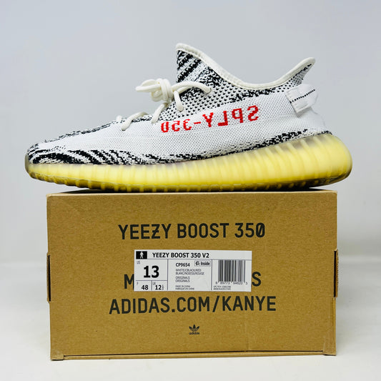 adidas Yeezy Boost 350 V2 Zebra sneakers on box, condition 8.5/10, 2017/2022 model.