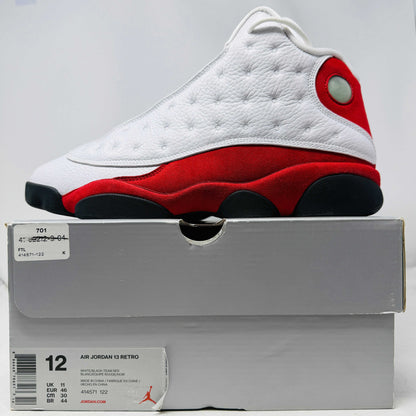 Jordan 13 Retro OG Chicago 2017 sneaker with white leather uppers and red suede detail on box size 12
