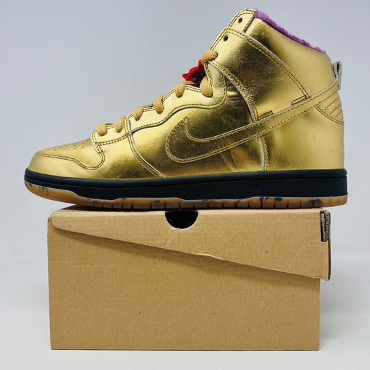 Nike SB Dunk High Humidity sneakers in metallic gold with slight scuff, rep box, and bow tie accessories, 2018 model.