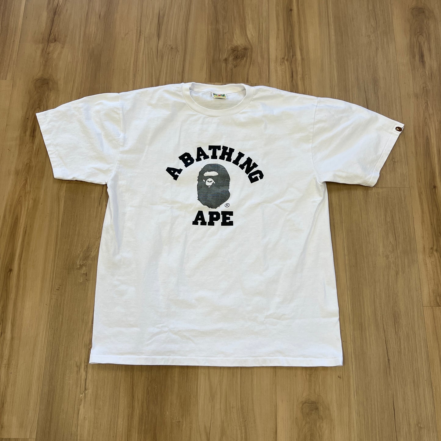 A Bathing Ape College Logo Tee camouflage-filled Ape Head logo