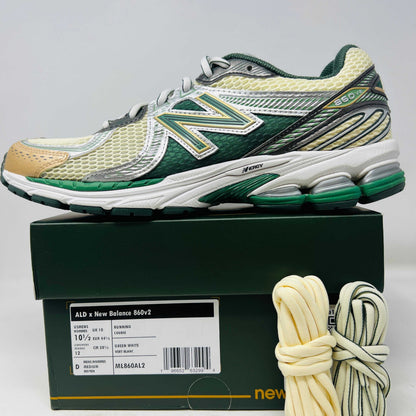 New Balance 860v2 Aime Leon Dore Green sneakers on box with extra laces.
