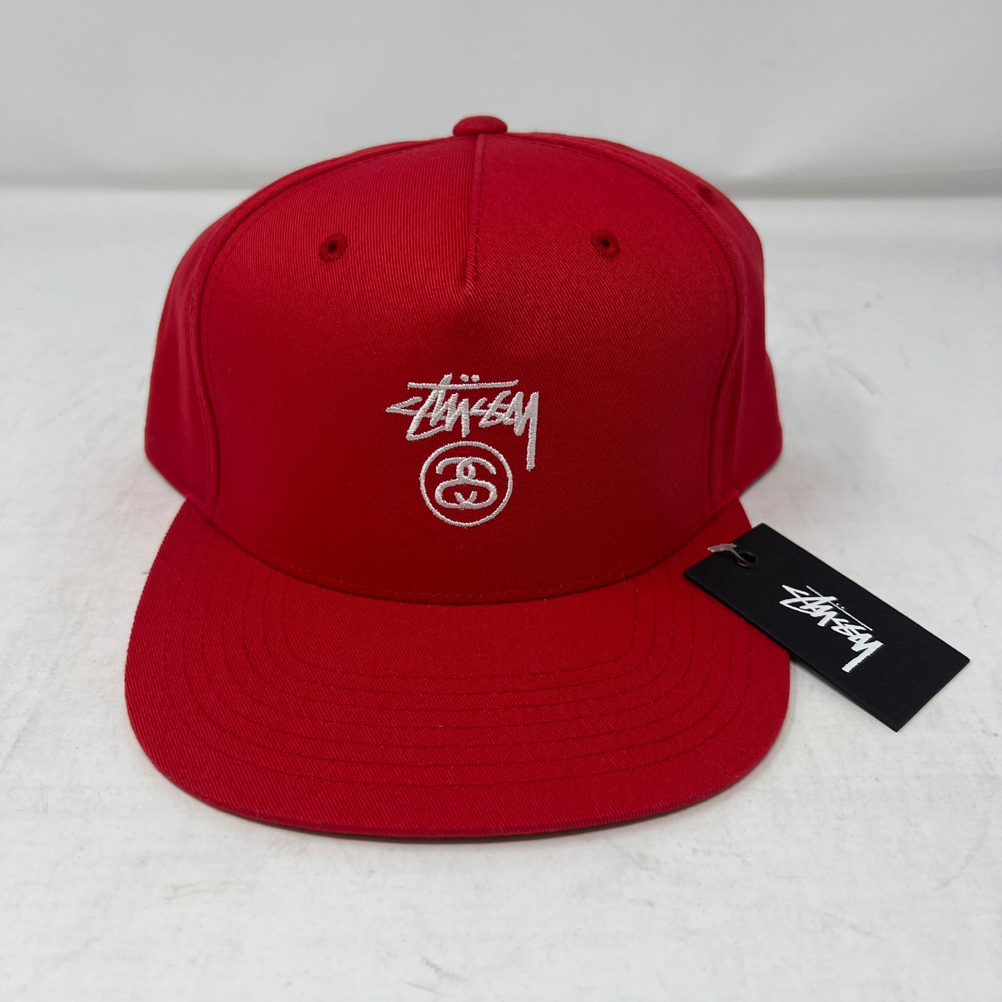 Stussy embroidered classic logo and double "SS" link