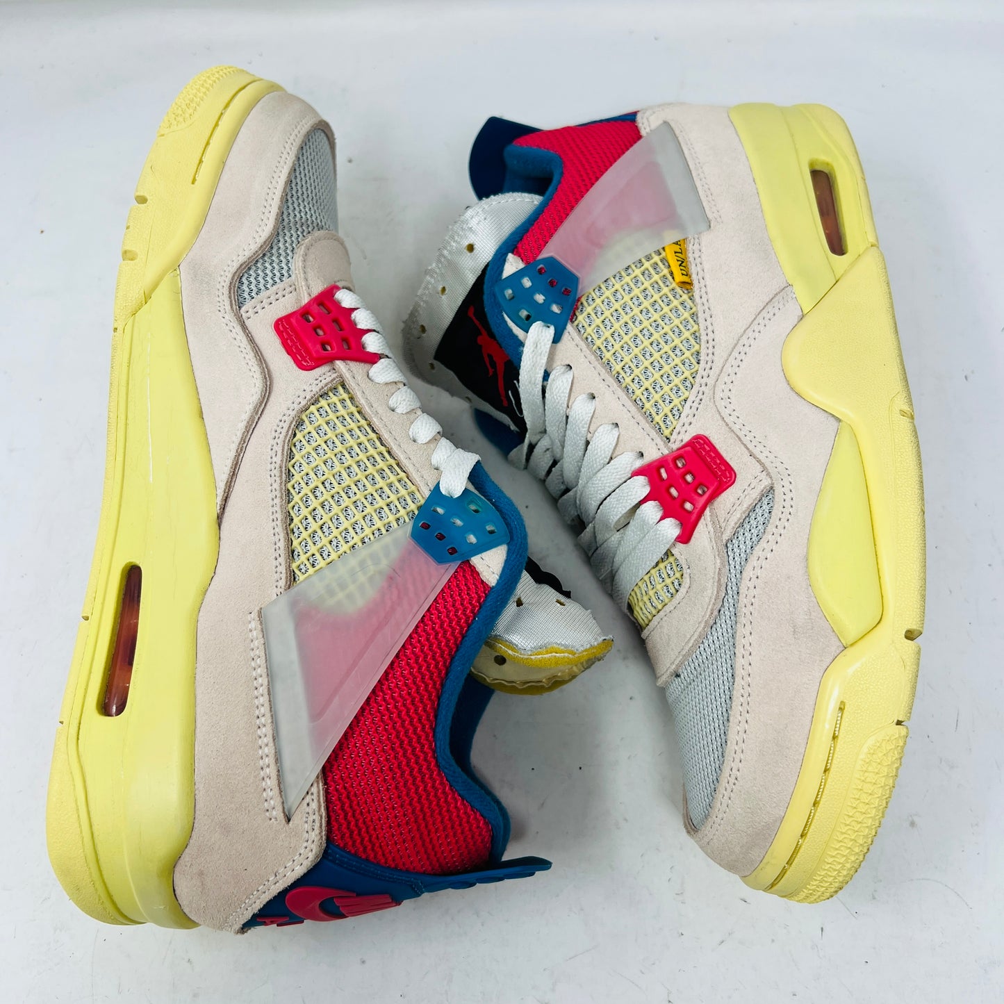 Jordan 4 Retro Union Guava Ice