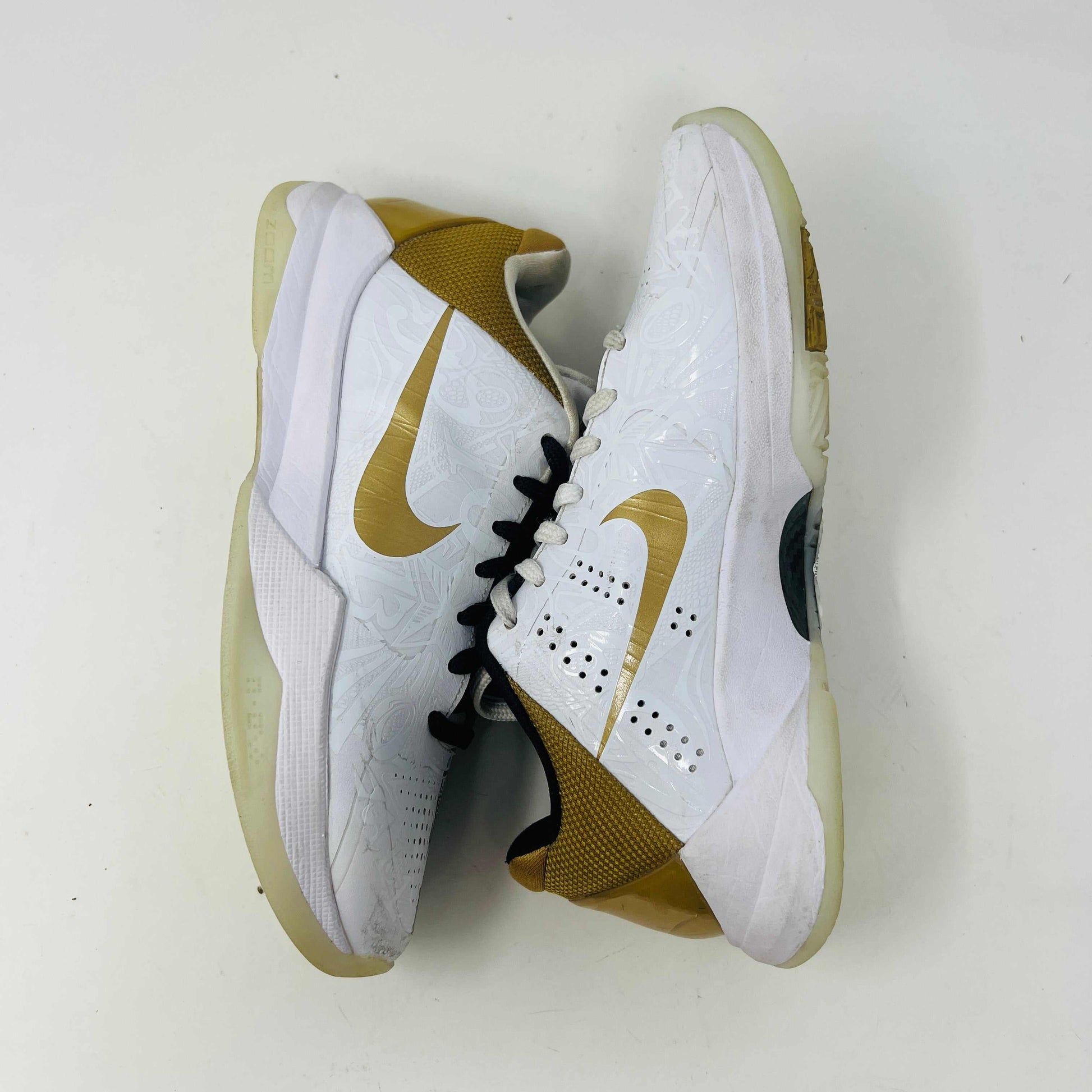 Nike Kobe 5 Protro Big Stage Parade sneakers with scuff on toe caps, released in 2020, displayed on a box.