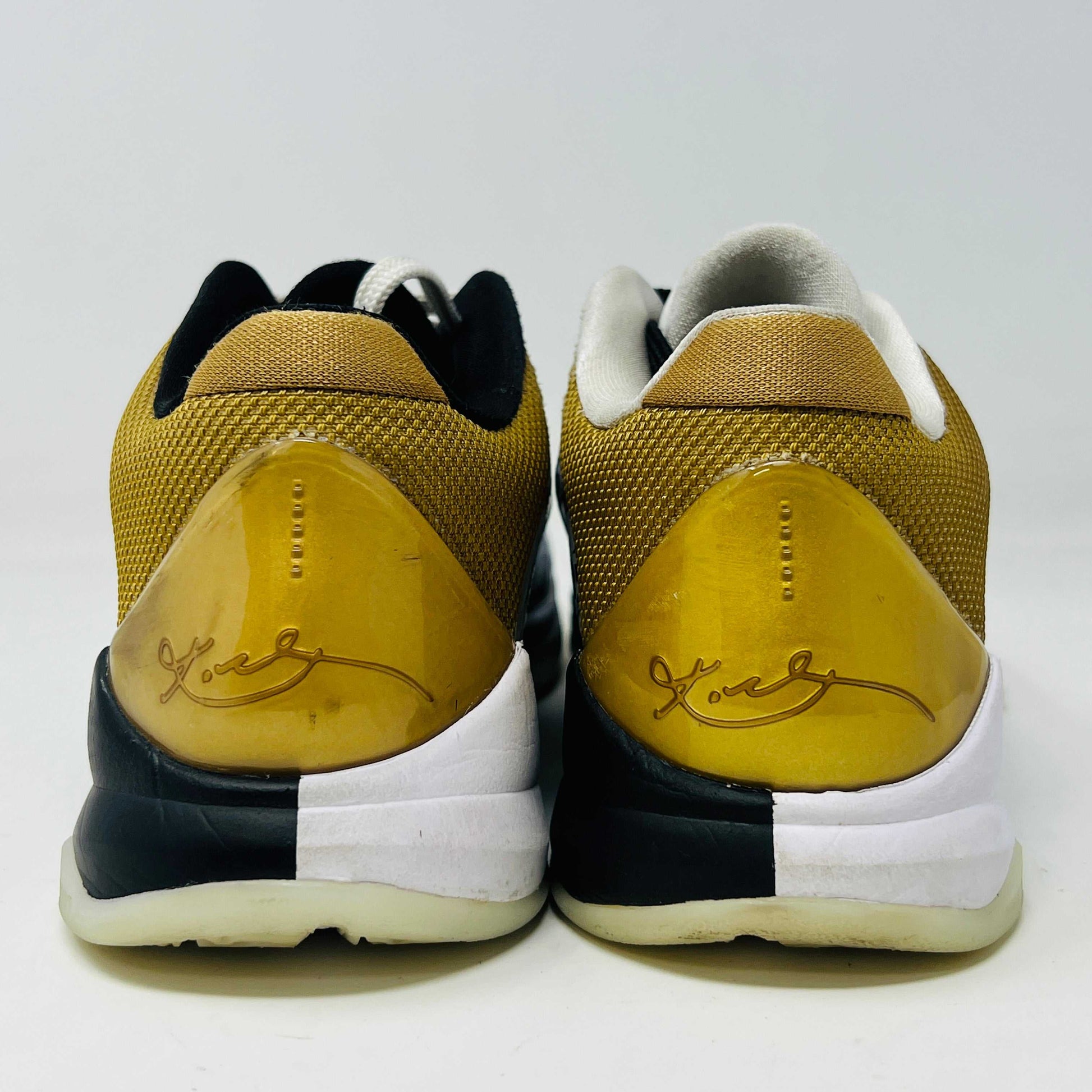 Nike Kobe 5 Protro Big Stage Parade sneakers with scuff on toe caps, released in 2020, displayed on a box.