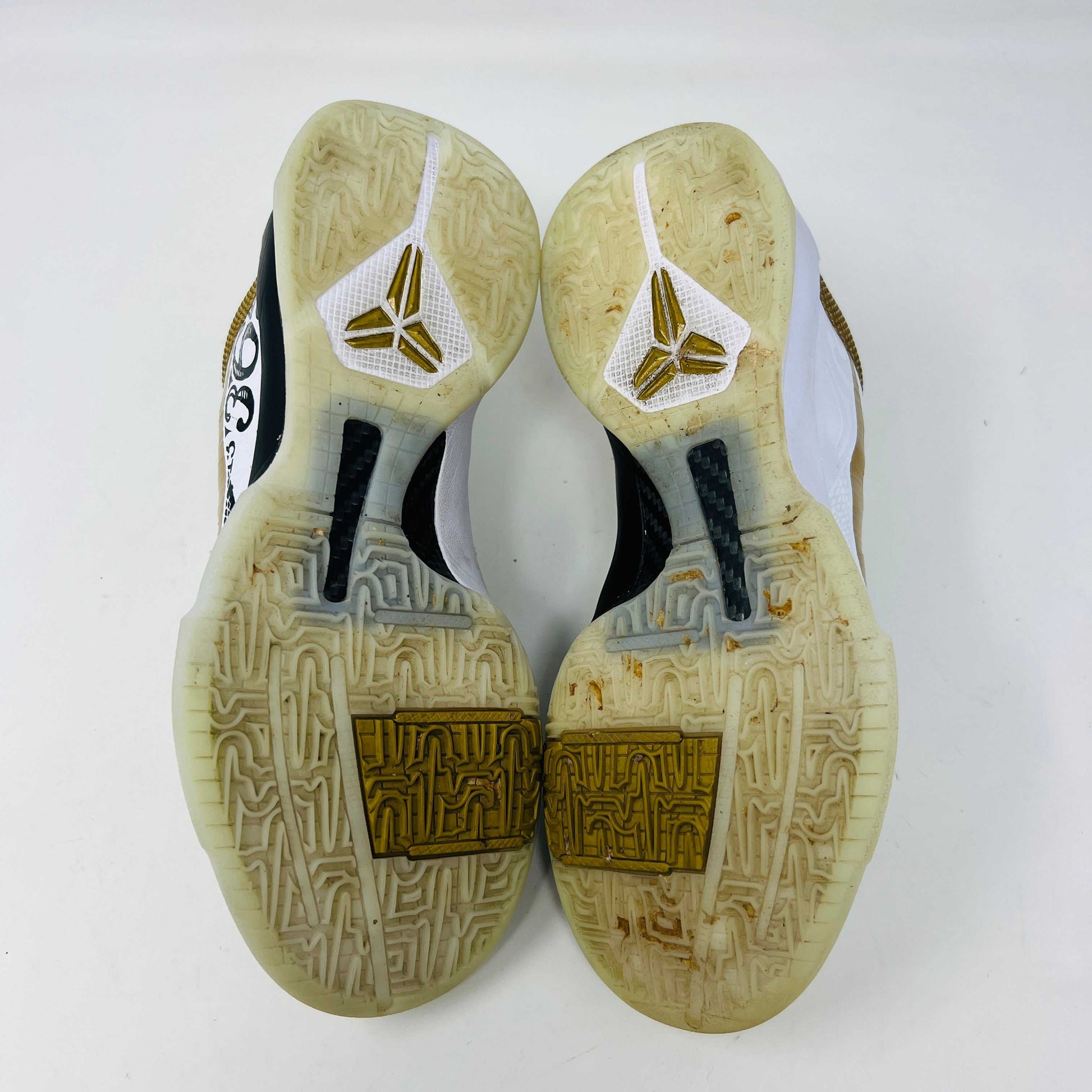 Nike Kobe 5 Protro Big Stage Parade sneakers with scuff on toe caps, released in 2020, displayed on a box.