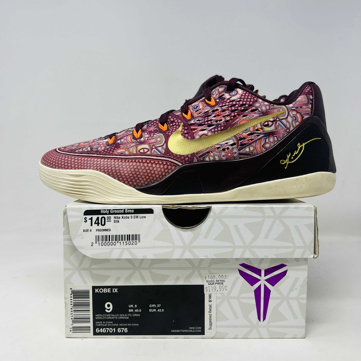 Nike Kobe 9 EM Low Silk sneakers on box with price tag.