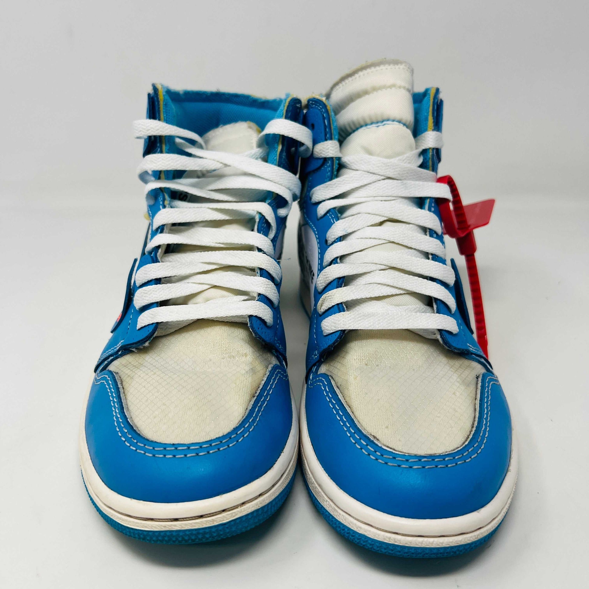 Jordan 1 Retro High Off-White University Blue sneakers, condition 8.5/10, 2018 release.