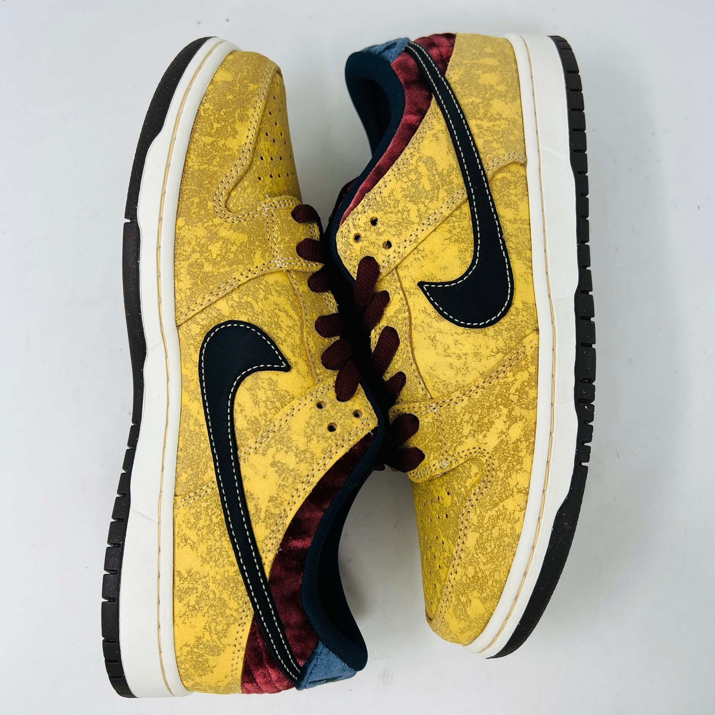 Nike SB Dunk Low City of Cinema sneakers in yellow with navy Swoosh, brand new condition, 2024 release.