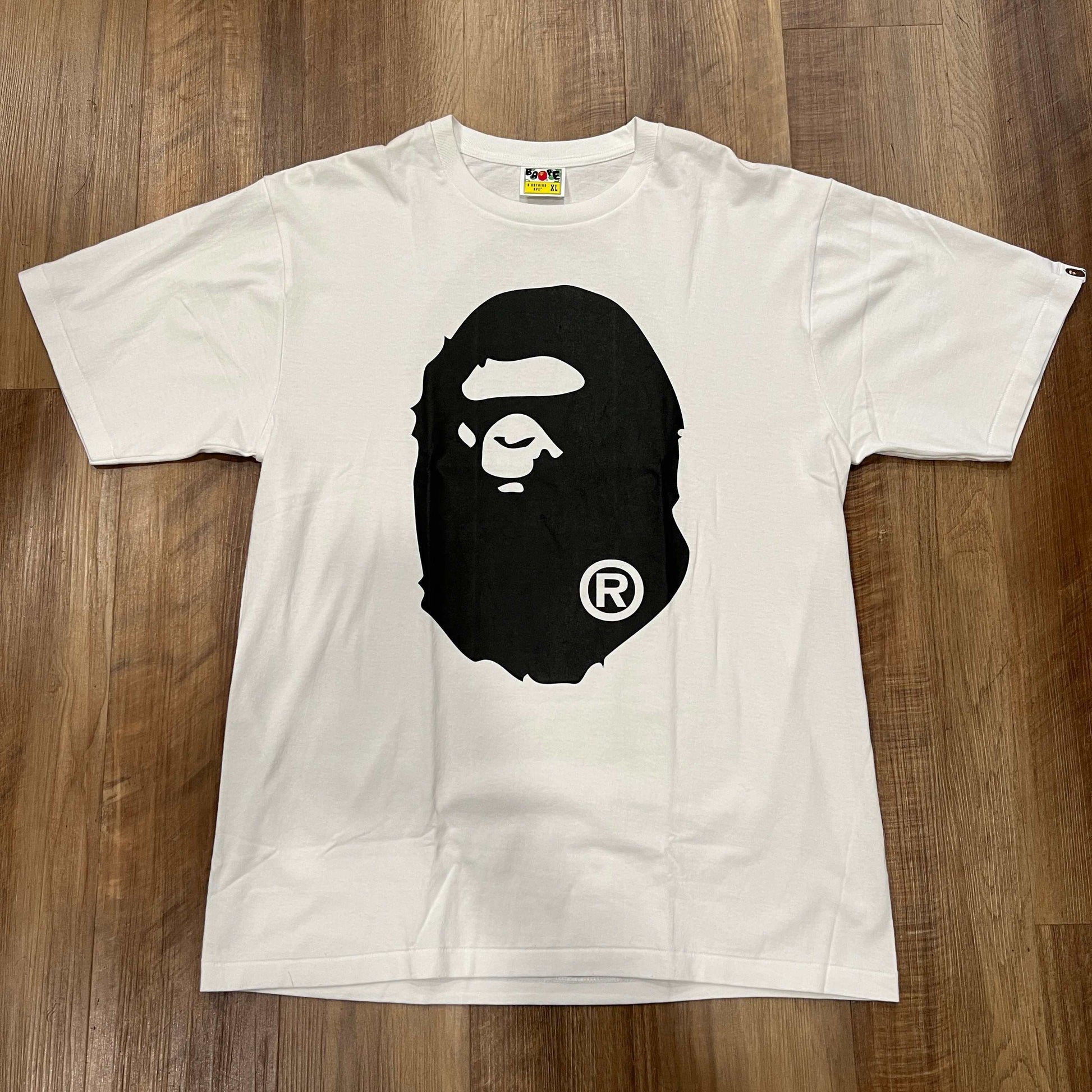 BAPE Head Tee XL in white with black logo, brand new condition.
