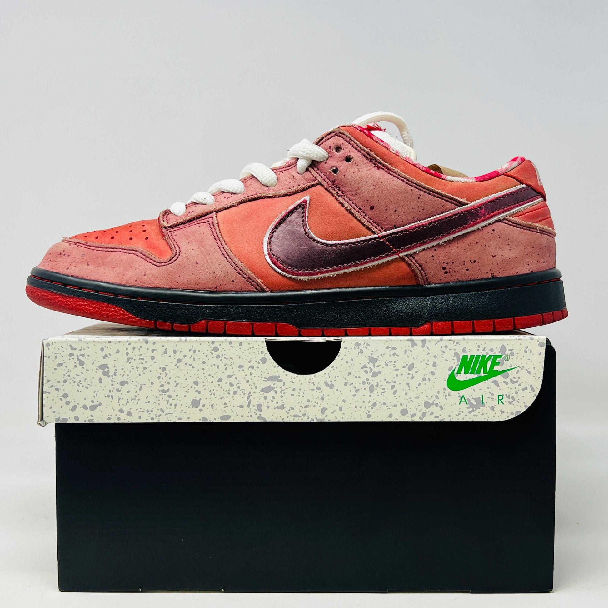 Nike SB Dunk Low Concepts Red Lobster sneakers with replacement box, 2008 edition.