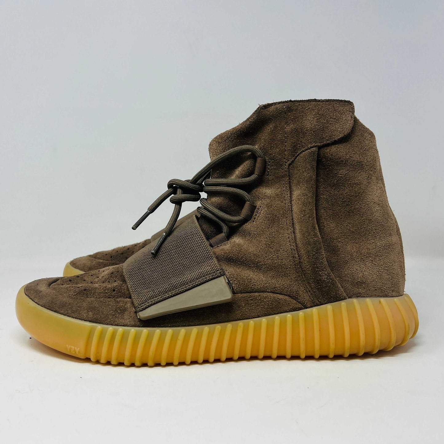 adidas Yeezy Boost 750 Chocolate sneakers with brown uppers and gum sole, 2016 model.
