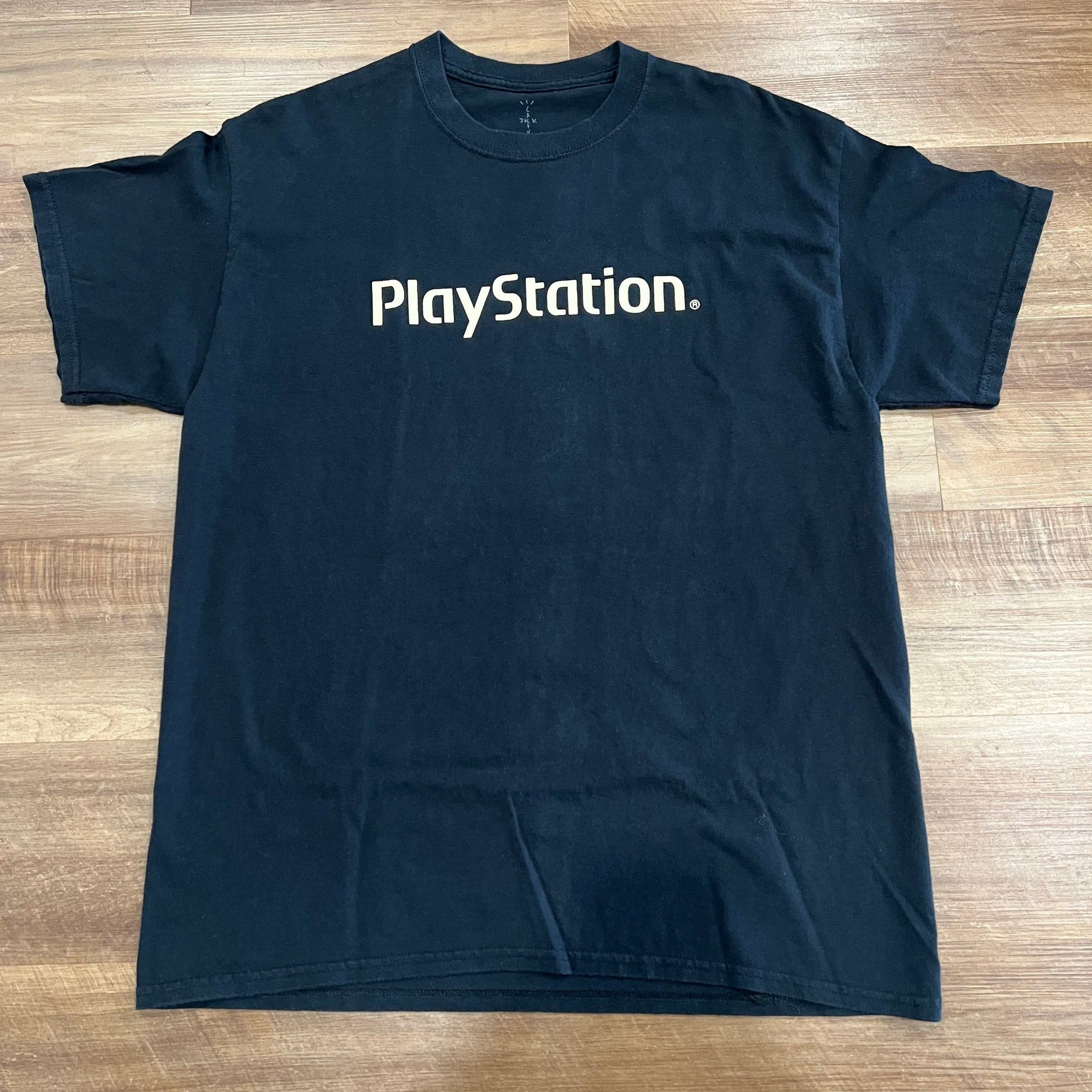 Black Travis Scott T-shirt with Motherboard Logo, size M, preowned condition.