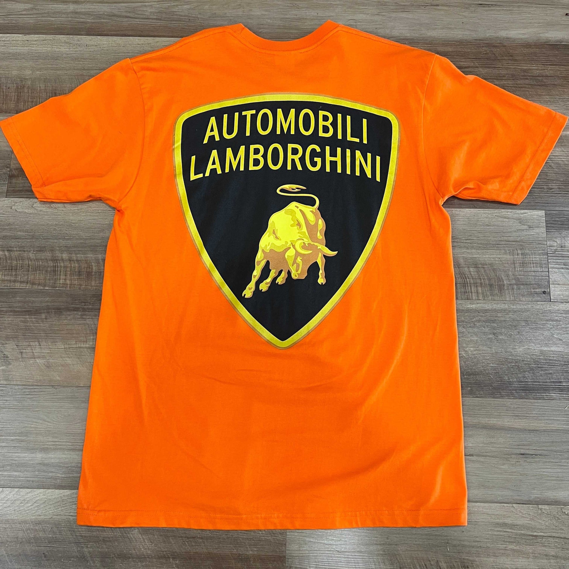 Orange Supreme Automobili Lamborghini tee, size L, brand new condition with logo on back.