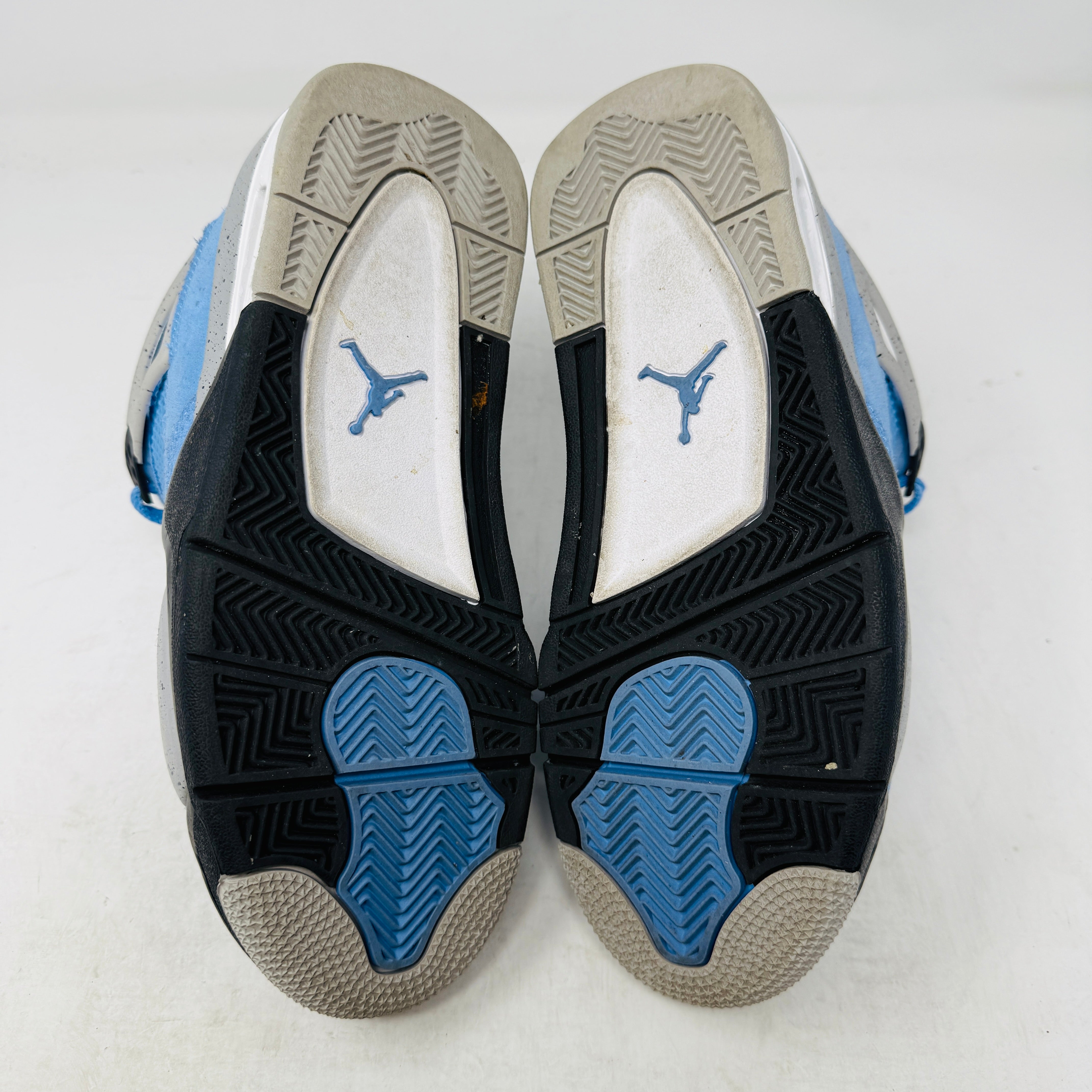 university blue jordan 4's