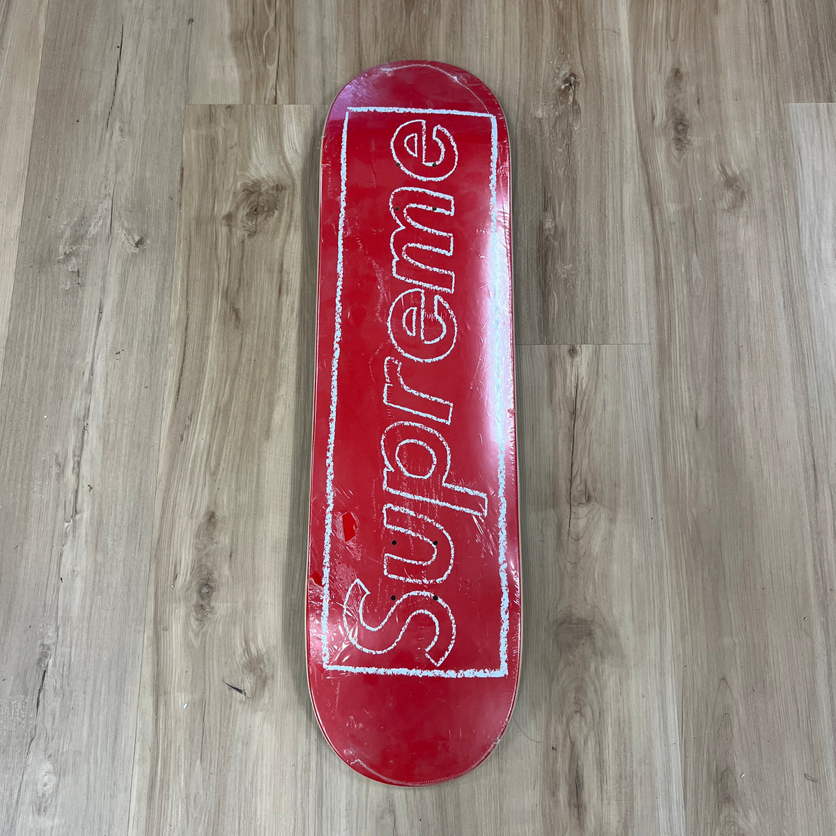 Supreme KAWS Chalk Logo Skateboard Deck Red