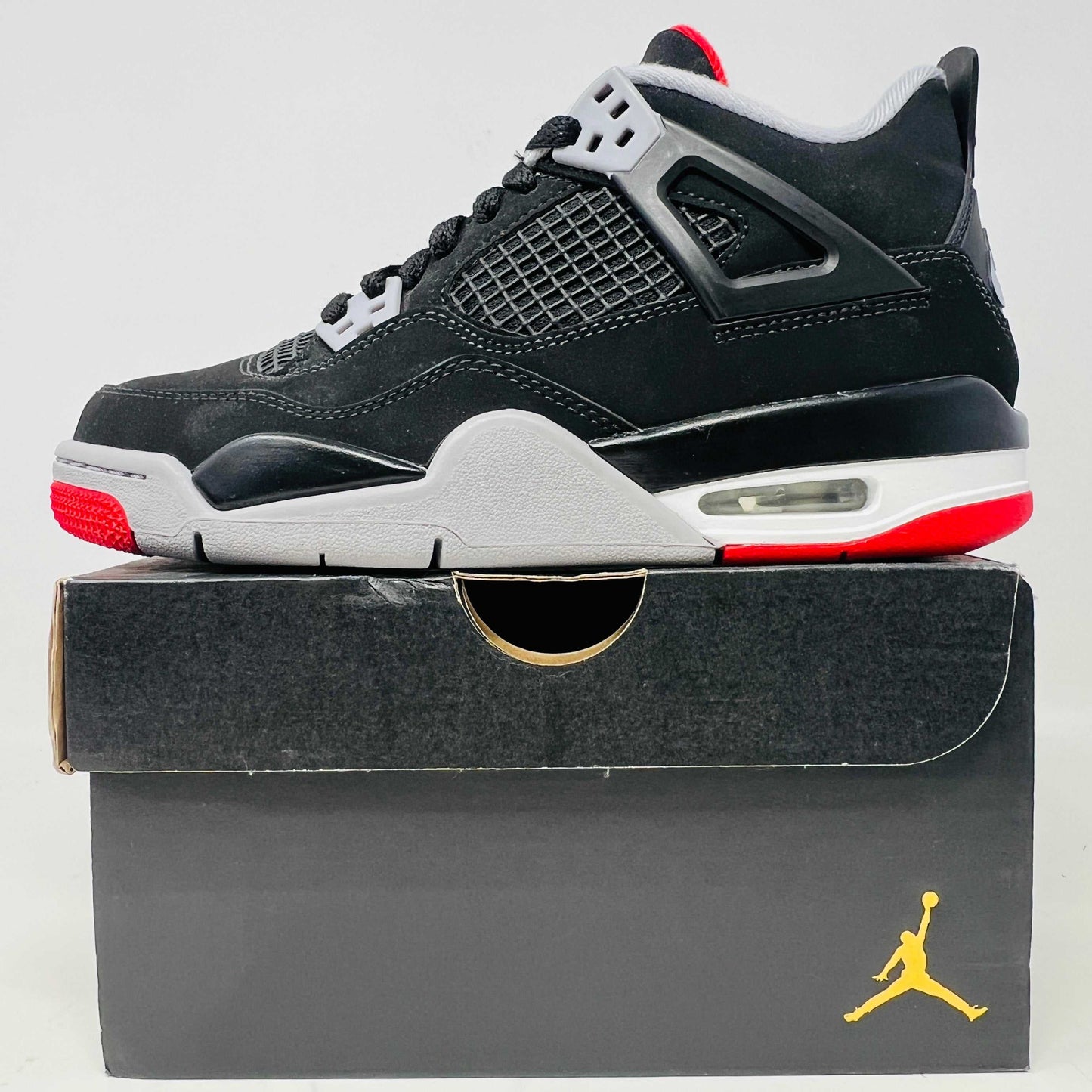 Jordan 4 Bred 2019 GS sneakers with hang tag in good box condition, brand new.
