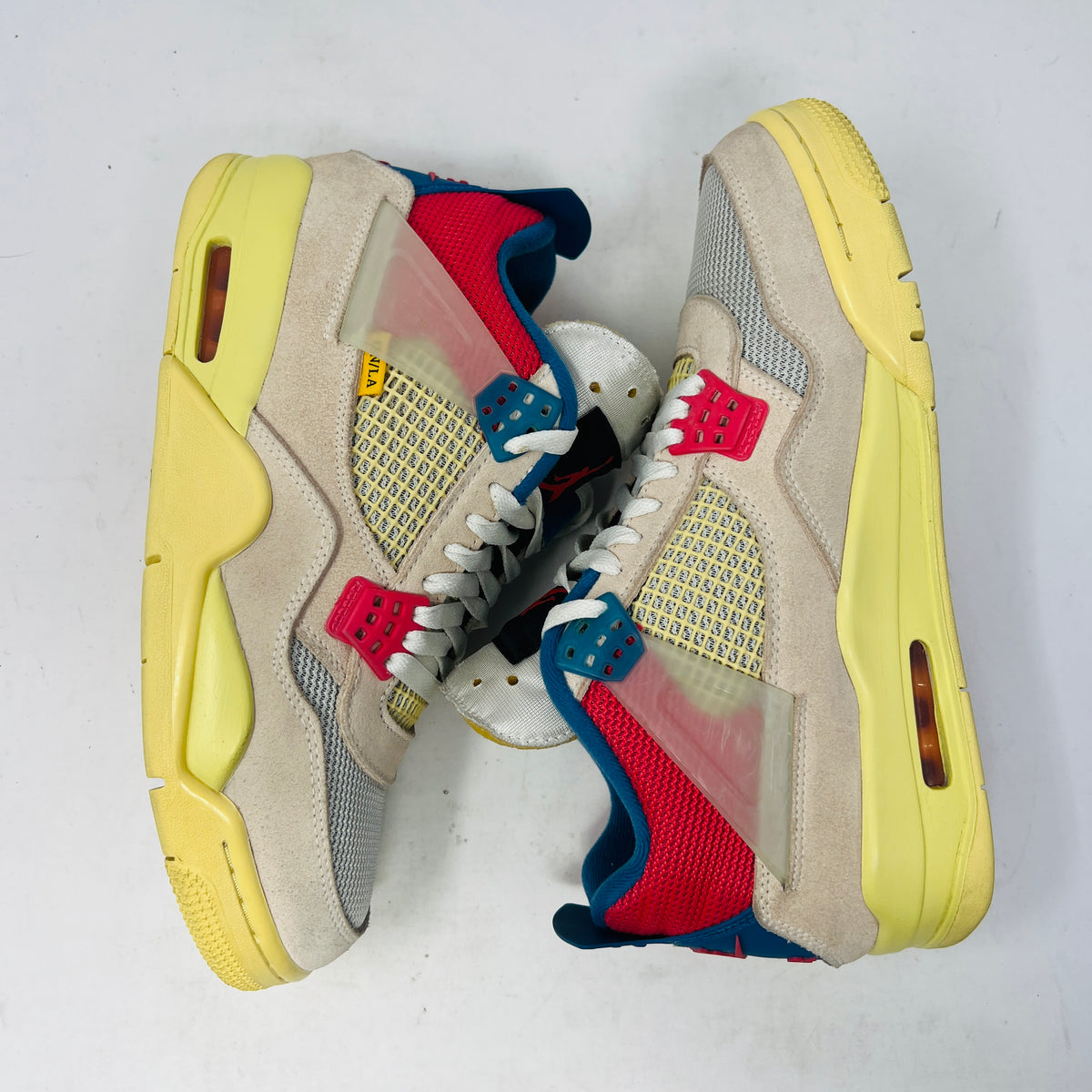Jordan 4 Retro Union Guava Ice