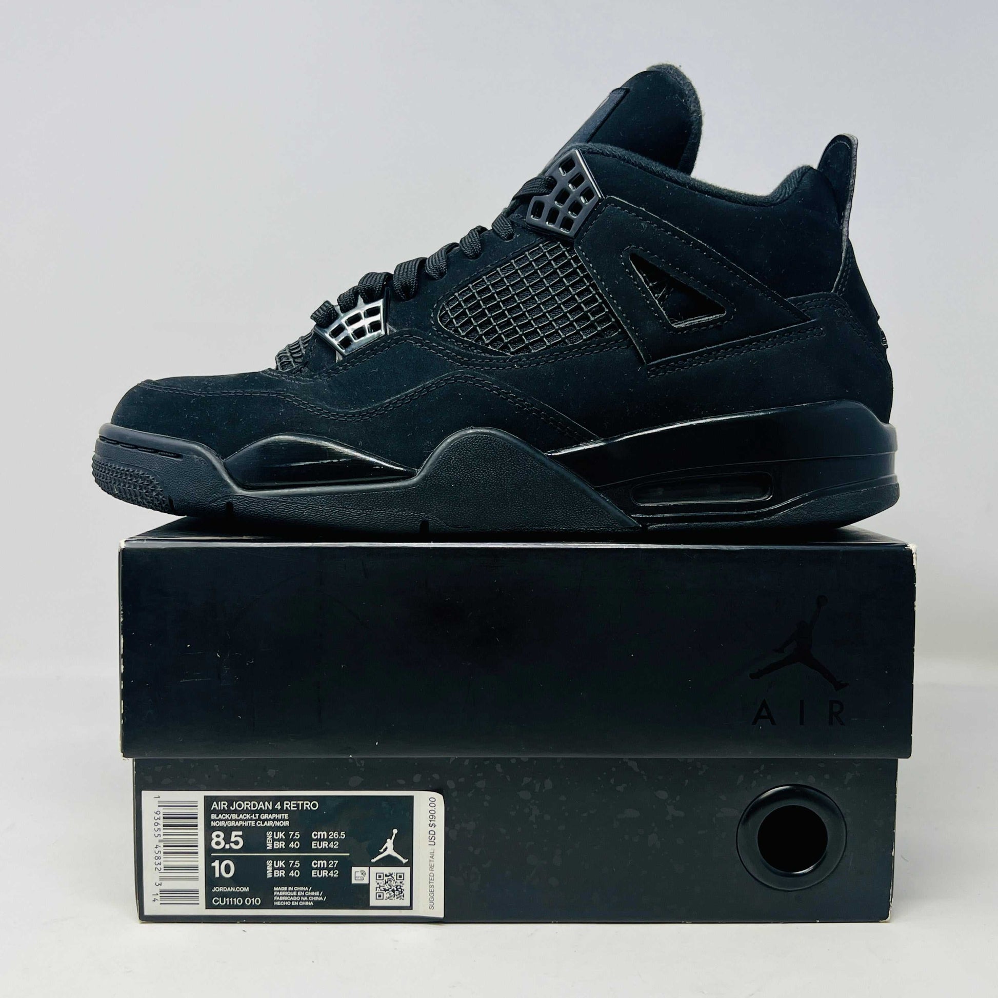 The Jordan 4 Retro Black Cat (2020) from Jordan is showcased on its authentic black box, displaying sizes 8.5 and 10. The sneaker features clean uppers, sturdy design with mesh panels, and a visible air unit in the sole, echoing timeless style.