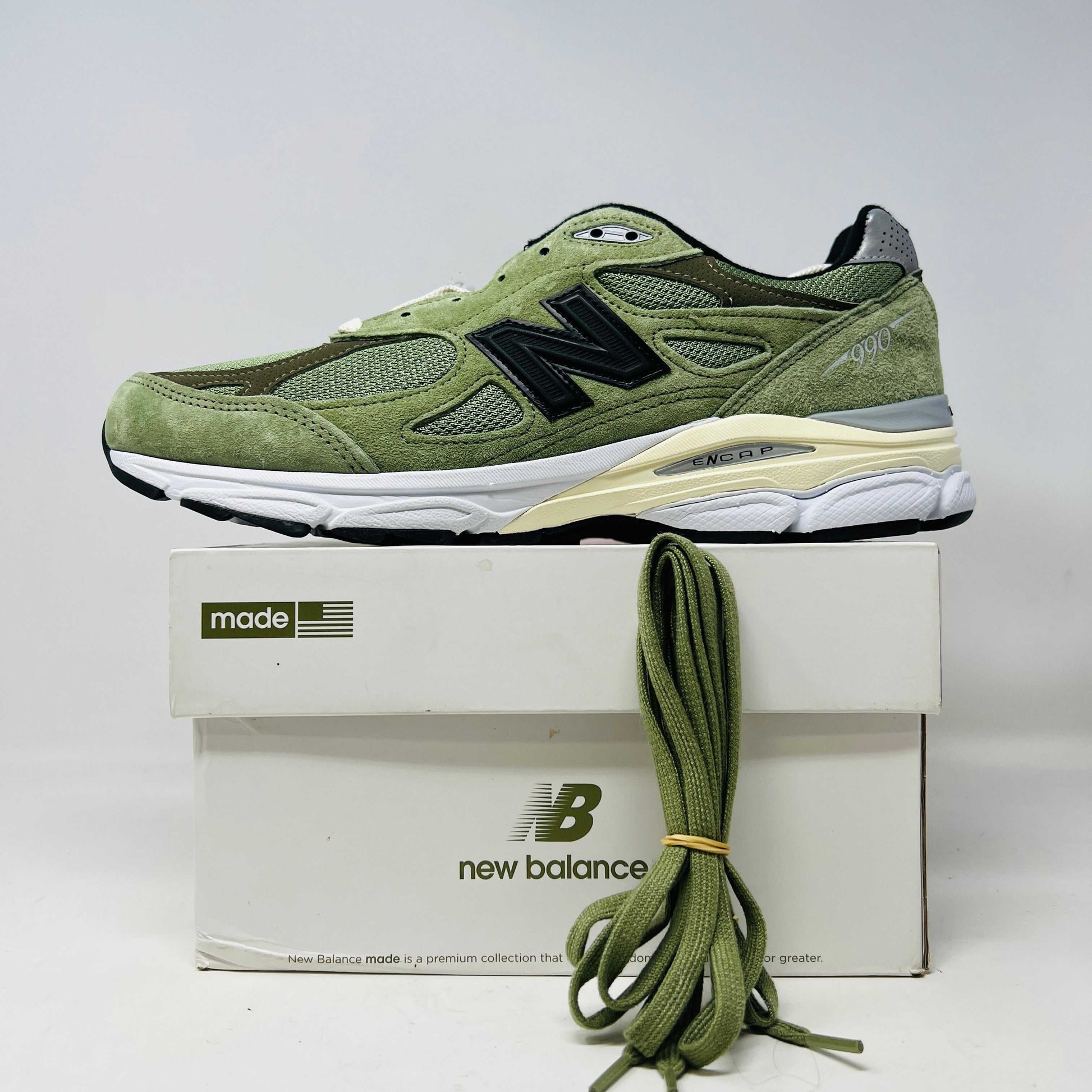 New Balance 990v3 MiUSA JJJJound Olive sneakers with extra laces, 2022 model.